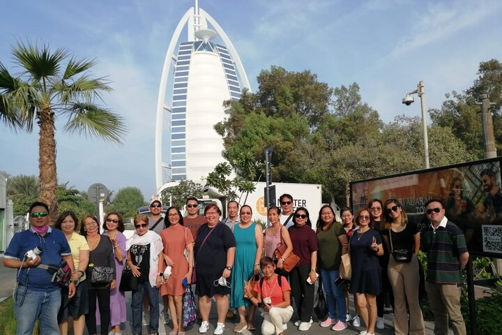 Experience the charm of Dubai with a personalized city tour exploring iconic landmarks sampling local cuisine and creating unforgettable memories alongside fellow travelers.